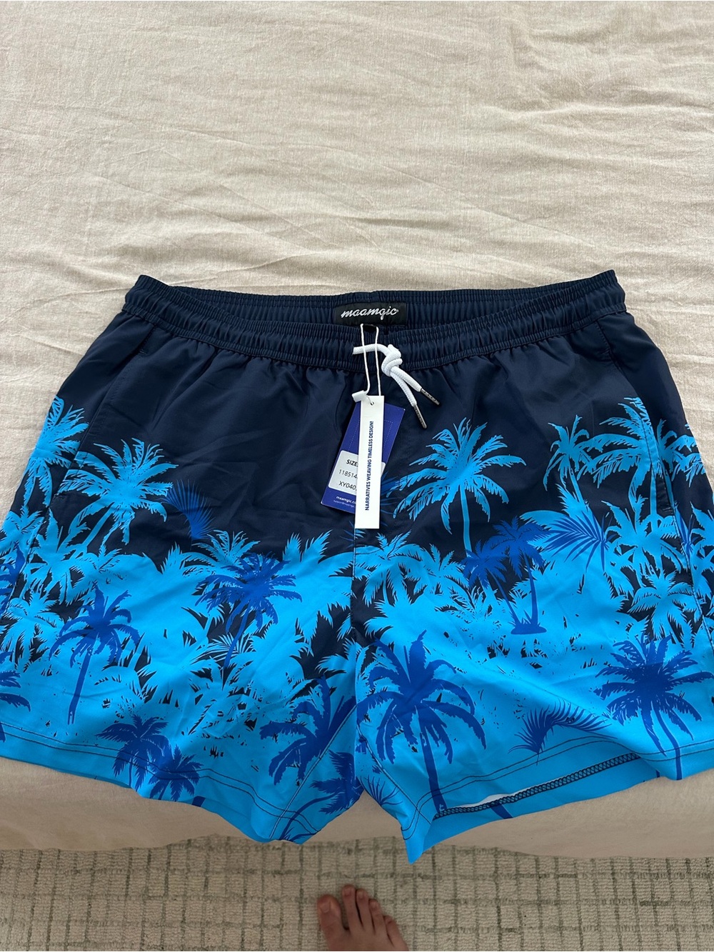 NWT Maamgic swim trunks